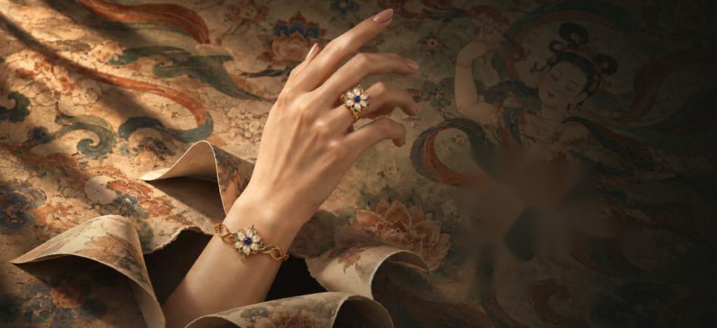 A hand against a Dunhuang mural